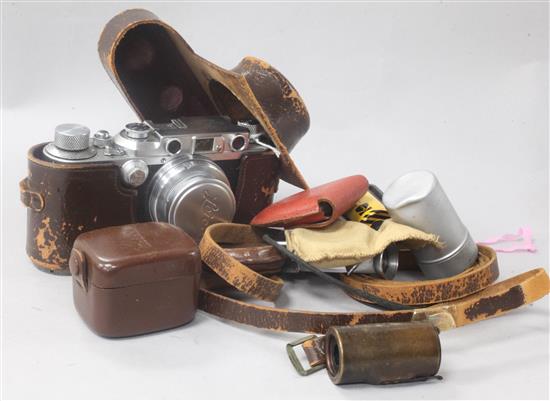 An Ernst Leitz Wetzlar Leica D.R.P. IIIA Rangefinder camera, Serial No. 279925, in original case (a.f), with accessories